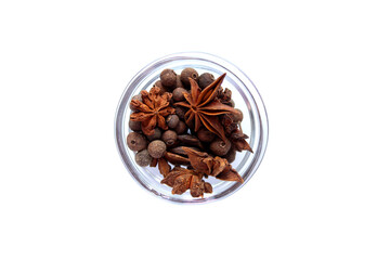 Series, spices on a white background, isolate, in different angles. Red, orange, bright anise in a bowl