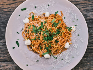 Traditional Italian spaghetti with fresh cheese