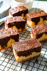 Chocolate marble cake square pieces. Serwing sweet dessert