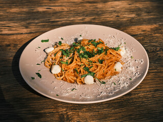 Traditional Italian spaghetti with fresh cheese