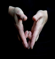 Woman's hands with black background