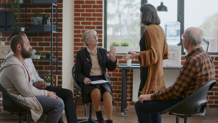 Woman with addiction crying and screaming at therapist while atending aa group meeting. Person having mental breakdown in front of people, complaining about nervous crisis at therapy.