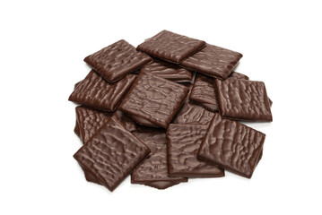 Dark chocolate candies isolated on white background.