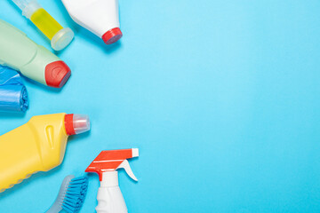 spray and sponges for cleaning and washing on a blue isolated background. Cleaning concept. Banner.