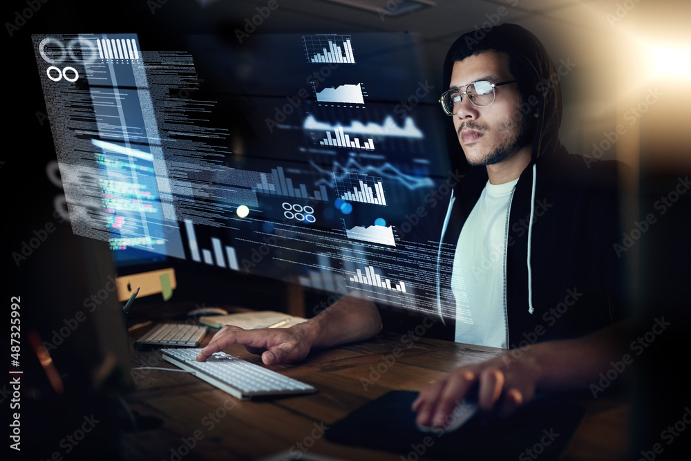Aufkleber Pulling the strings through programming. Shot of a young hacker cracking a computer code in the dark.