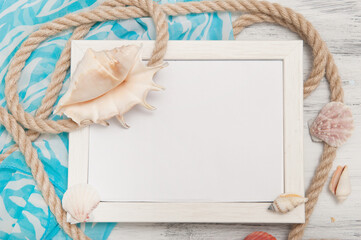 White blank nautical frame with ropes and seashell