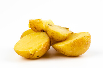 potatoes in their skins on a white background. Cooked and cooled potatoes in the skin.