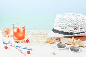 Cocktail with ice and red raspberries