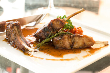 Grilled Race of New Zealand lamb with Rosemary Sauce International food at restaurant of hotel.