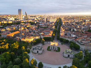 Aerial view of Arco della Pace in Milano, north Italy. Drone photography of Arch of Peace in Piazza Sempione, near Sempione park in the heart of Milan, Lombardy and Sforza Castle.
