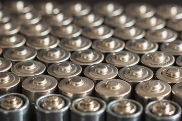AA batteries background closeup view