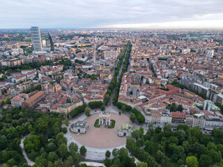 Aerial view of Arco della Pace in Milano, north Italy. Drone photography of Arch of Peace in Piazza Sempione, near Sempione park in the heart of Milan, Lombardy and Sforza Castle.