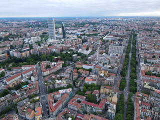 Obraz premium Aerial view of Arco della Pace in Milano, north Italy. Drone photography of Arch of Peace in Piazza Sempione, near Sempione park in the heart of Milan, Lombardy and Sforza Castle.