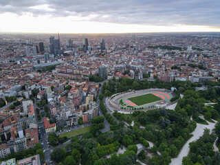 Aerial view of Arco della Pace in Milano, north Italy. Drone photography of Arch of Peace in Piazza Sempione, near Sempione park in the heart of Milan, Lombardy and Sforza Castle.