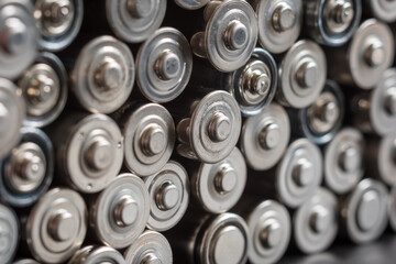 AA batteries background closeup view
