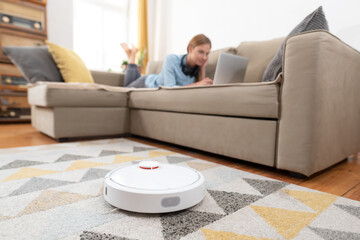 Modern robotic vacuum cleaner, smart home concept
