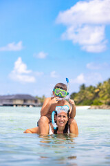 Mother and son snorkeling on the Maldive Islands - obrazy, fototapety, plakaty