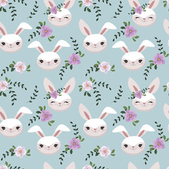 Seamless pattern with cute rabbits and flowers.