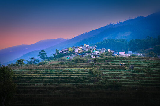 sunrise over the mountains in Munnar, Vattavada