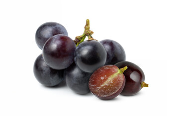 Black grape with half sliced isolated on white background. 