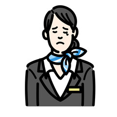 悲しそうに涙を流している客室乗務員の若い女性
