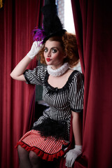 girl clown in vintage costume