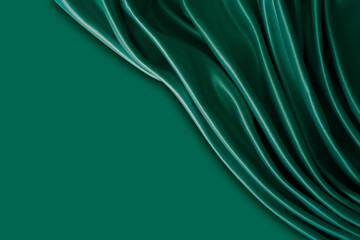 Beautiful elegant wavy dark green satin silk luxury cloth fabric with monochrome background design. Wallpaper, banner. Copy space.