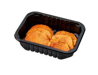 raw mini pork schnitzel in plastic tray isolated