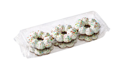 Chistmas wreath cookies in a plastic tray