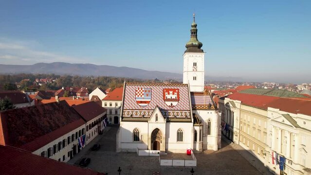Aerial Approach Colorful Patterned Shield Roof of Iconic and Famous Saint Mark's Church Zagreb Croatia No People Crkva sv Marka Drone 4k