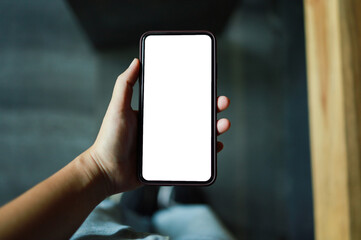 Women's hands holding cell telephone blank copy space screen. smart phone with technology concept