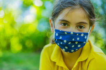 Little girl with mask