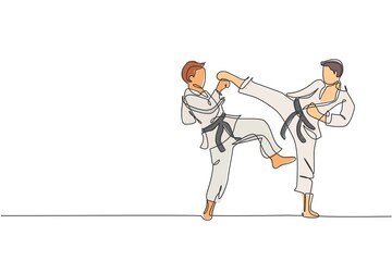 Single continuous line drawing two young confident karateka men in kimono practicing karate combat at dojo. Martial art sport training concept. Trendy one line draw design vector graphic illustration © Simple Line