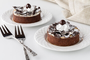 Close up of mini gourmet chocolate cakes ready for eating.