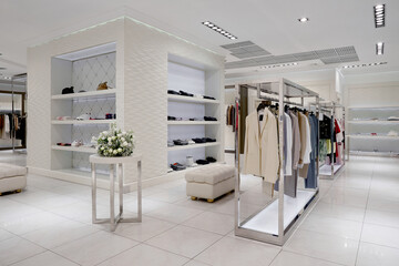 luxury interior women clothing store in modern mall, front store.