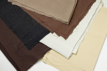 Folded fabrics texture background. These fabric is made of cotton and polyester.