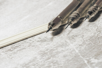 Set of sharp scrapers and fiberglass brushes for the mechanical cleaning of coins and...