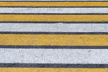 Designation of an unregulated pedestrian crossing in high-risk areas. Pedestrian zebra yellow-white