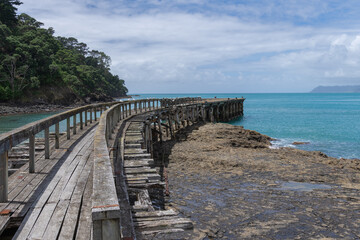 Remains of old wharf or jetty stretching out from land