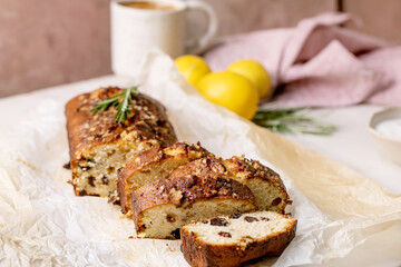 Homemade lemon cake with nuts and rosemary