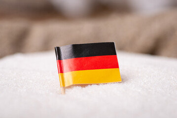 Flag of Germany in granulated sugar. Making sugar in Germany concept
