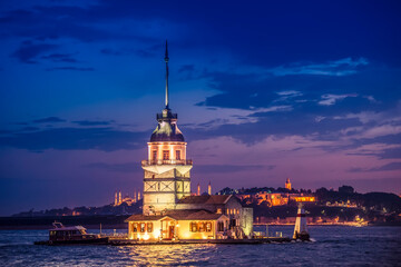 Istanbul Bosporus, a panorama , ships and Maiden's Tower at sunset.