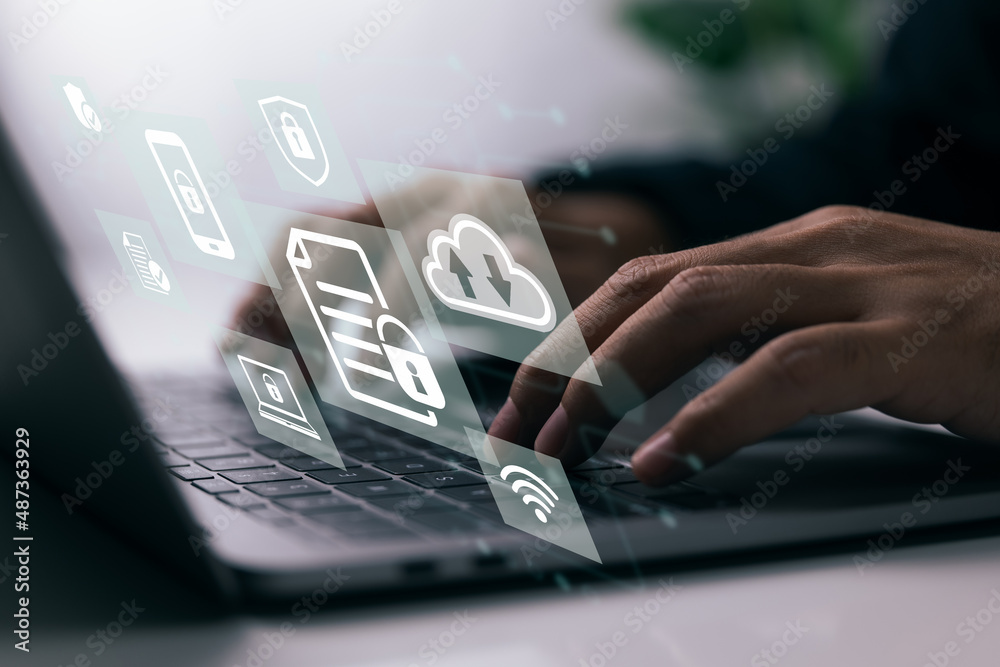 Poster Concept of data protection with a person who is using a laptop computer.