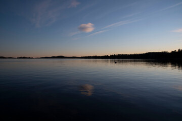 sunset over the fjord with cloud 