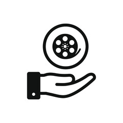 Film roll on hand. Cinema, movie, filmstrip icon design isolated. Vector illustration