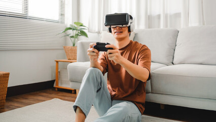 Asian man using VR headset in glasses of virtual reality technology VR experience Future technology