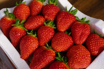 Strawberries in a white basket, bought in a Korean local farmer's market
