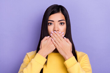 Photo of negative mood stressed girl covering mouth say bad words isolated on purple color...