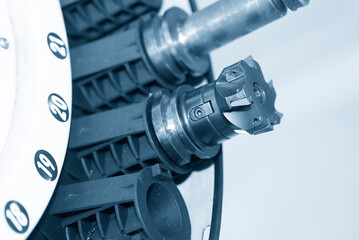 The face mill tool in the tooling magazine of machining center. © Pixel_B