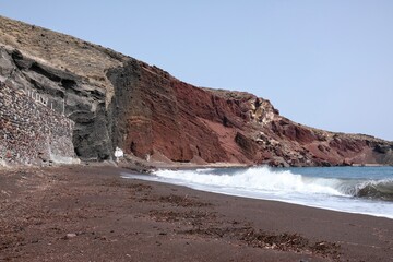 Panoramic view of the famous red beach on a windy day in Santorini 